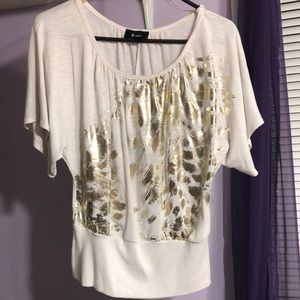 White blouse with gold detail